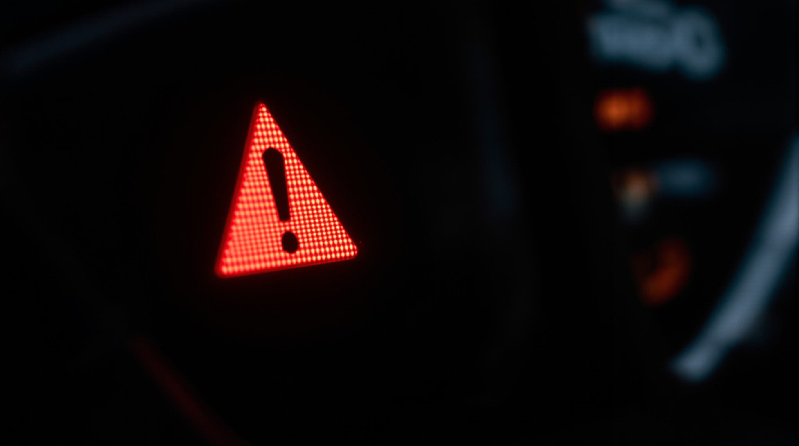 A hybrid car instrument cluster with warning indicator lamps illuminated